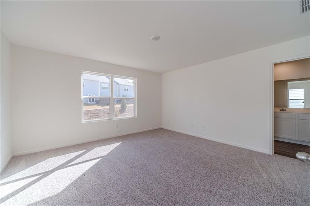 29 Padley Drive Winder, GA 30680 - Photo 19 of 25 a view of an empty room with a window