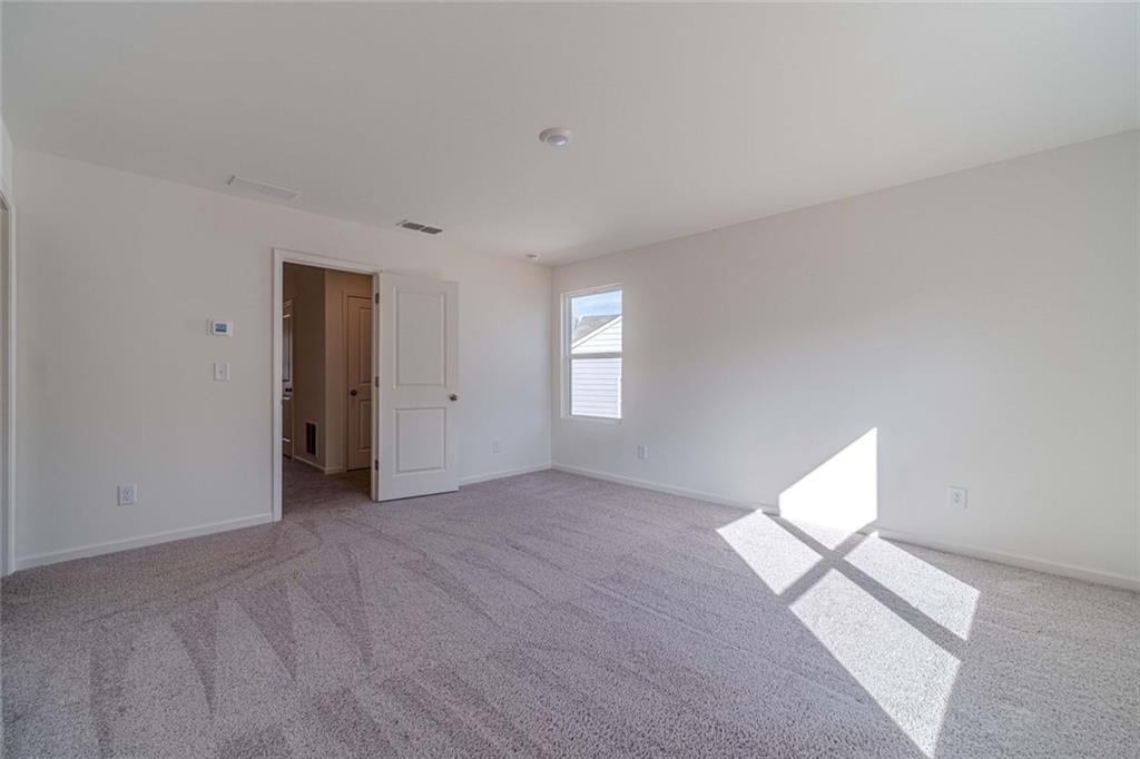29 Padley Drive Winder, GA 30680 - Photo 21 of 25 an empty room with windows and closet