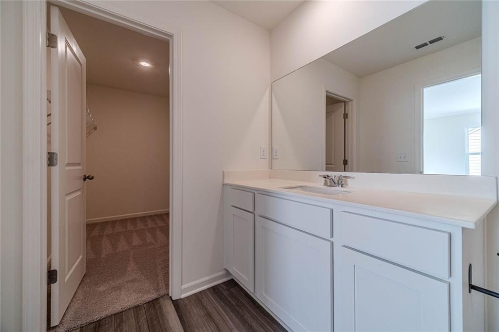 29 Padley Drive Winder, GA 30680 - Photo 24 of 25 a bathroom with a sink and a mirror