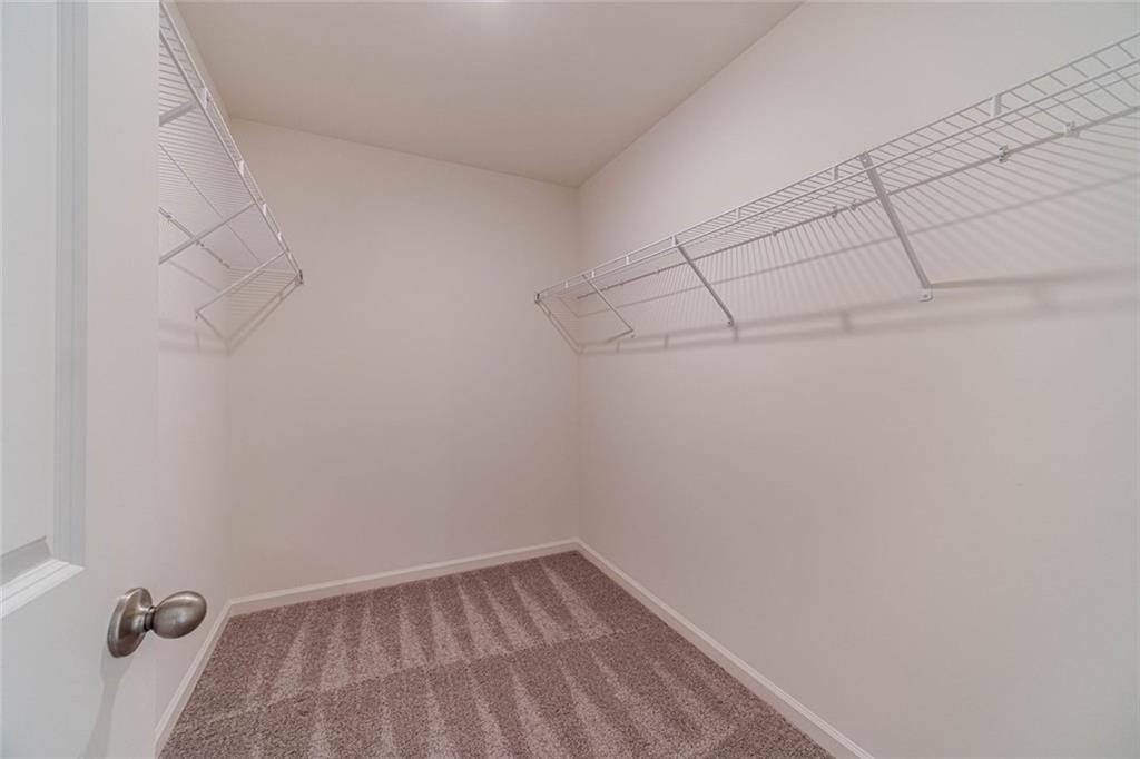 29 Padley Drive Winder, GA 30680 - Photo 25 of 25 a view of a room with racks on the wall
