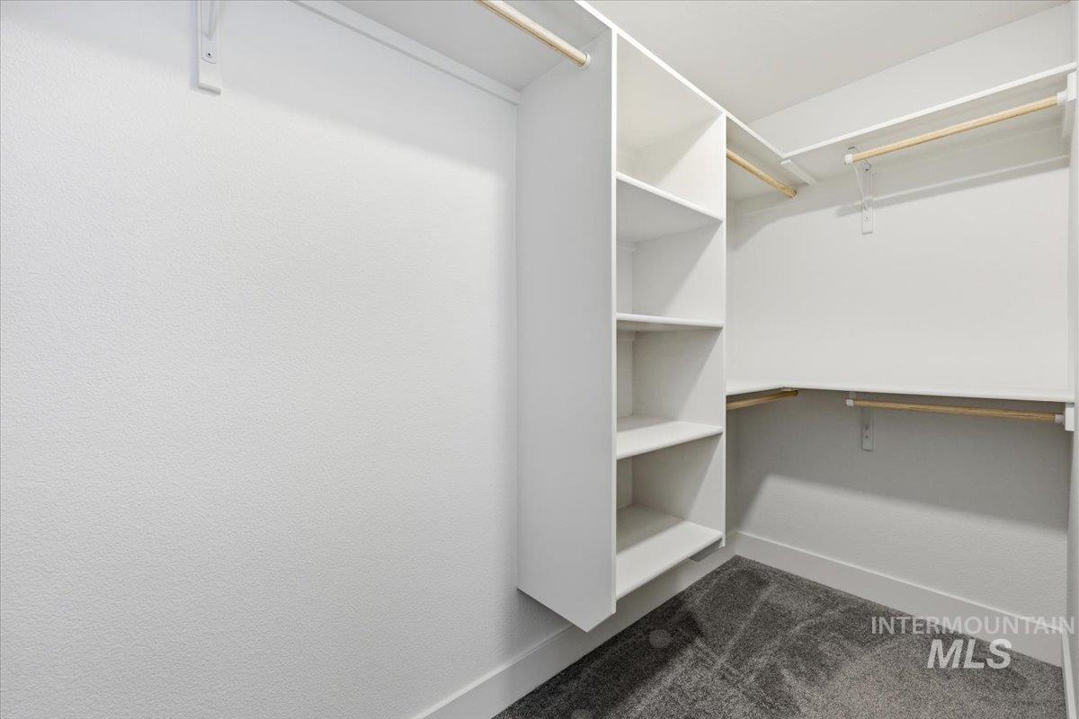 148 Homesteaders Street Middleton, ID 83644 - Photo 29 of 45 Walk in closet featuring dark colored carpet