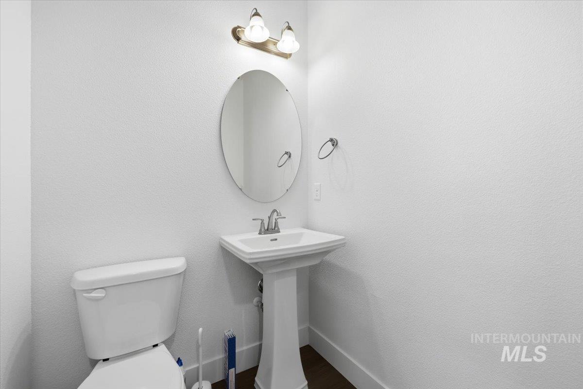 148 Homesteaders Street Middleton, ID 83644 - Photo 7 of 45 Bathroom with toilet and baseboards