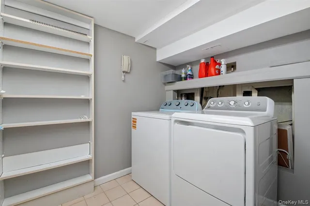a utility room with washer and dryer