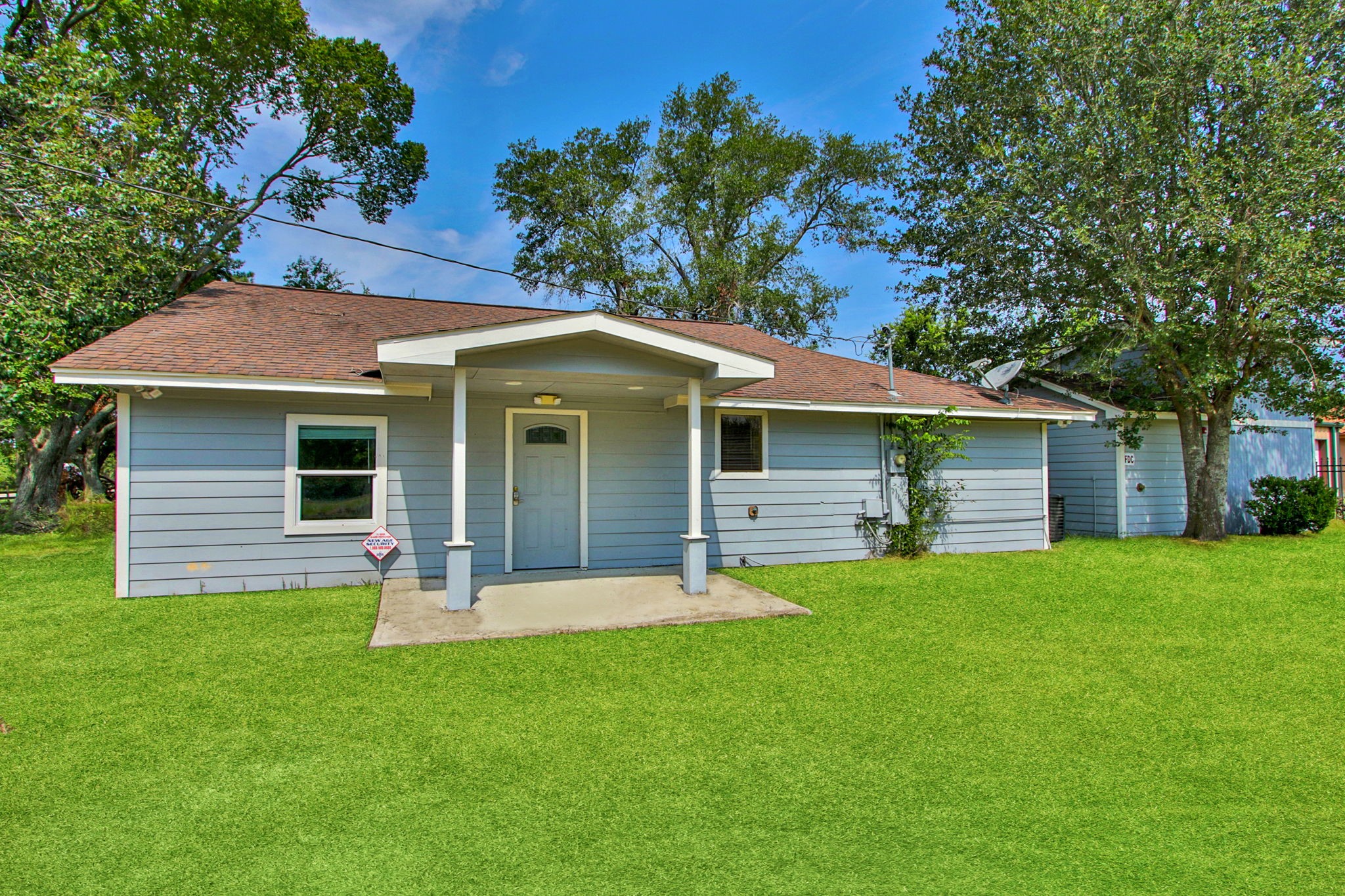 17018 Grant Road Cypress, TX 77429 - Photo 43 of 50 a front view of house with yard and green space