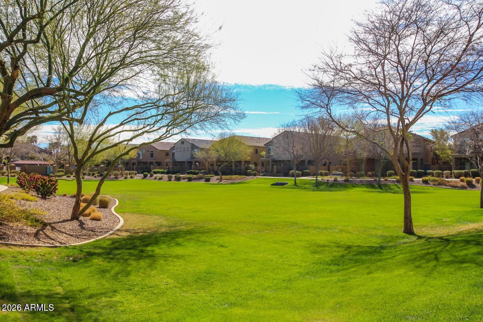 1350 South Greenfield Road, Unit 1053 Mesa, AZ 85206 - Photo 23 of 25 a view of a garden with an apartment