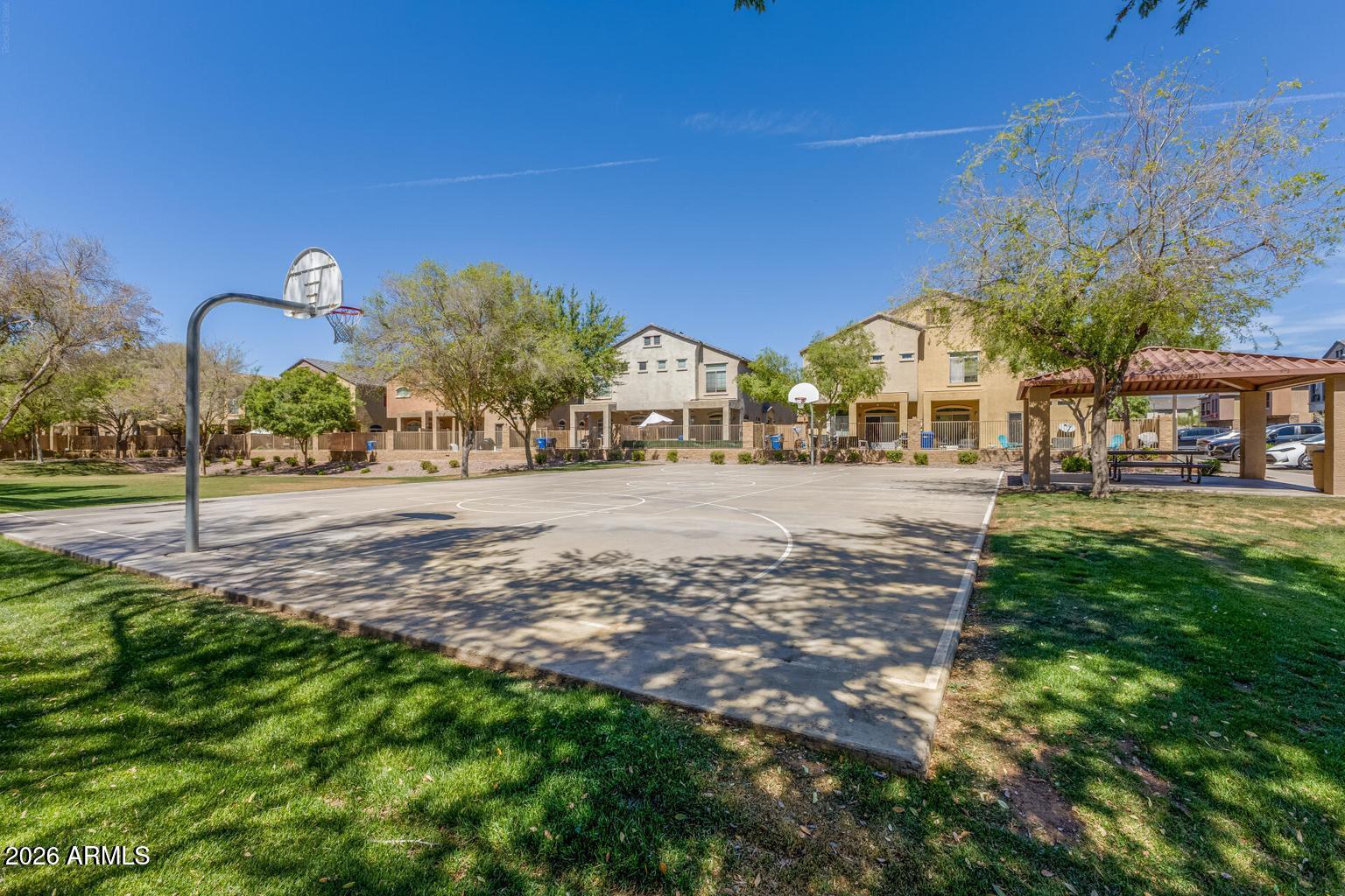 1350 South Greenfield Road, Unit 1053 Mesa, AZ 85206 - Photo 25 of 25 a front view of a house with a yard