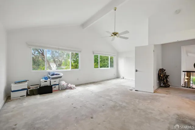 a view of livingroom with furniture and a window