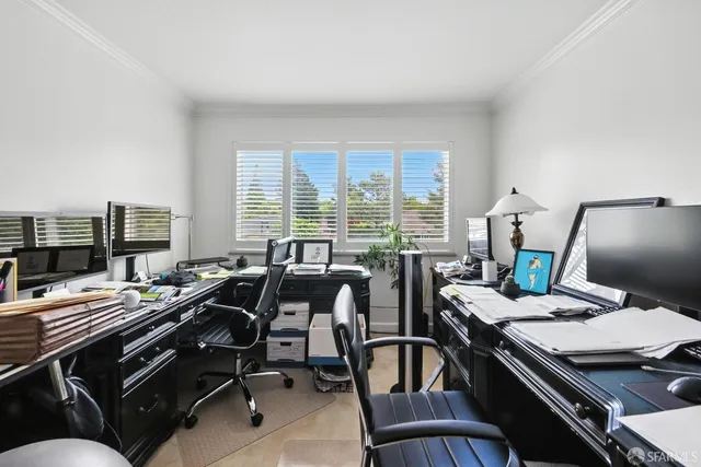 a view of a livingroom with furniture and a table