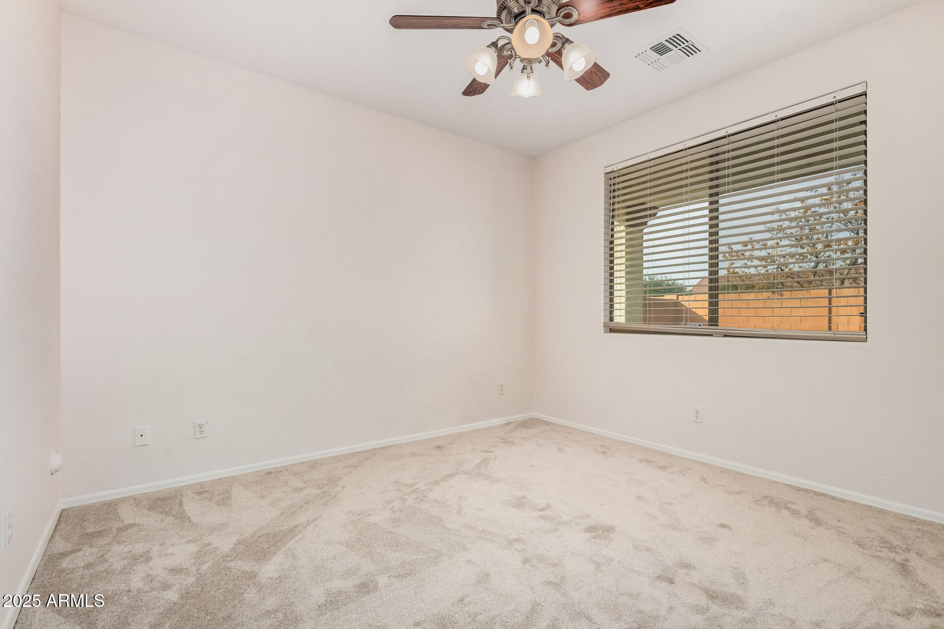 14784 West Riviera Drive Surprise, AZ 85379 - Photo 12 of 28 an empty room with a window