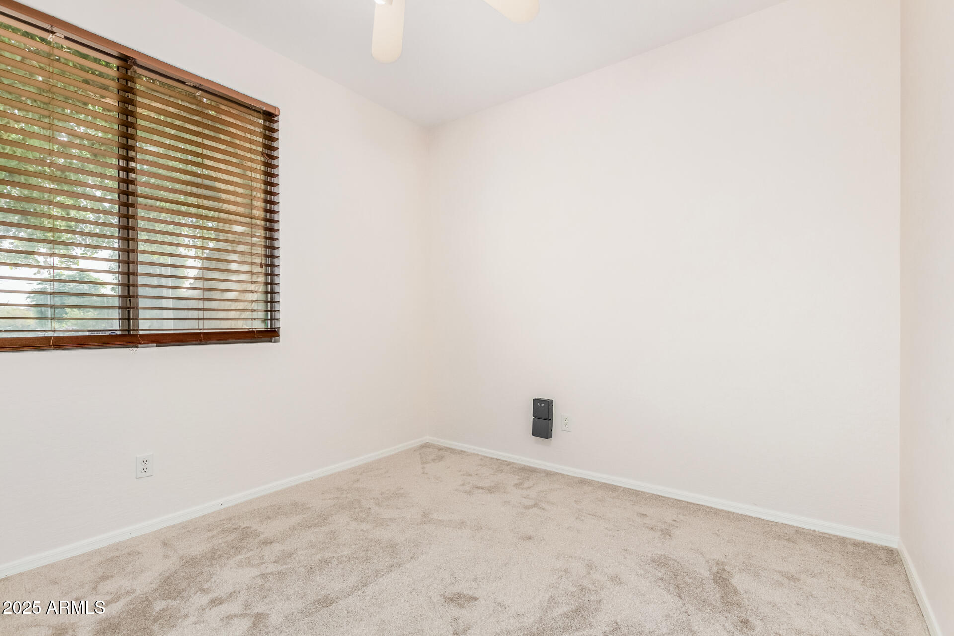 14784 West Riviera Drive Surprise, AZ 85379 - Photo 19 of 28 a view of a small space with a window