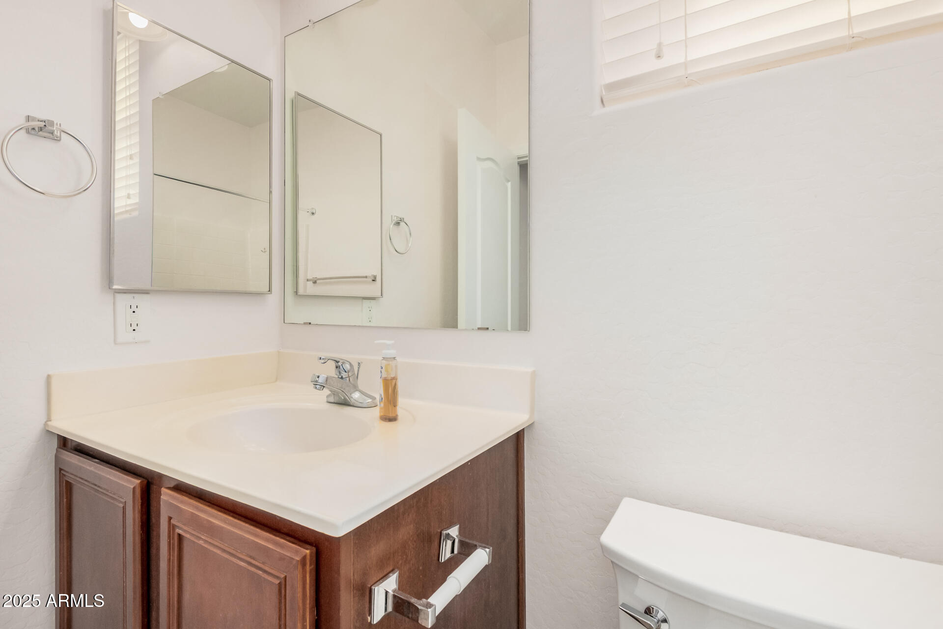 14784 West Riviera Drive Surprise, AZ 85379 - Photo 21 of 28 a bathroom with a sink toilet and vanity