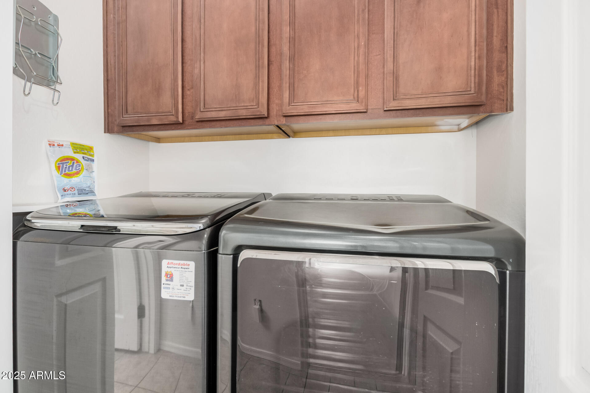 14784 West Riviera Drive Surprise, AZ 85379 - Photo 22 of 28 a utility room with dryer and washer
