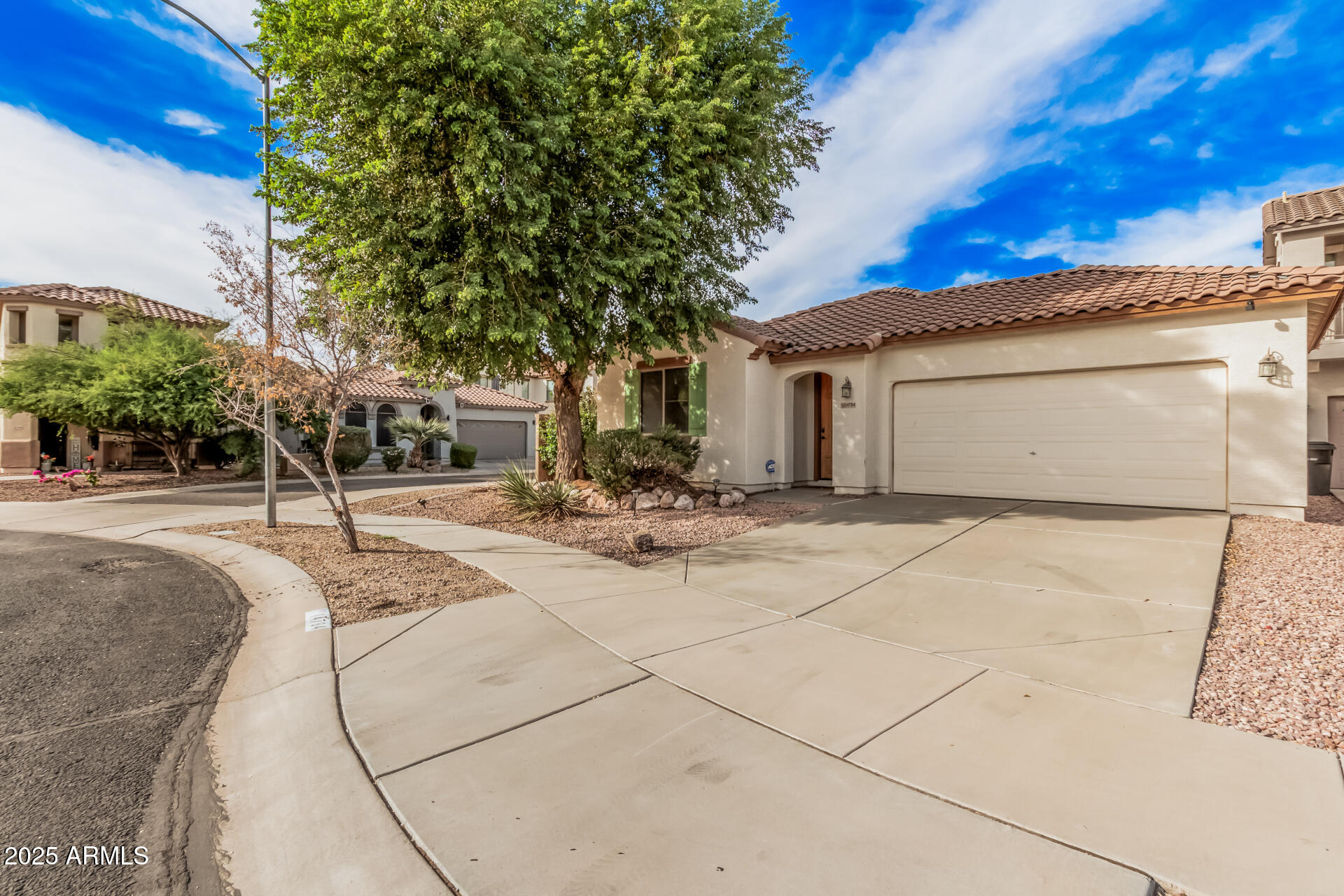 14784 West Riviera Drive Surprise, AZ 85379 - Photo 3 of 28 a view of a patio with a tree