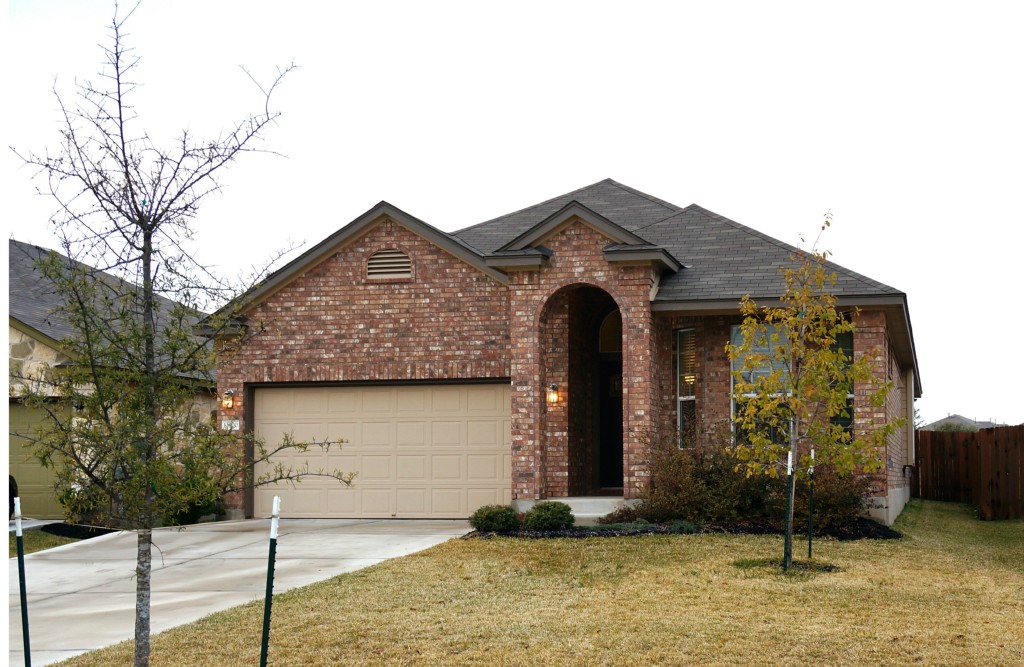 13900 Marathon Road Austin, TX 78717 - Photo 1 of 1 a front view of a house with garage
