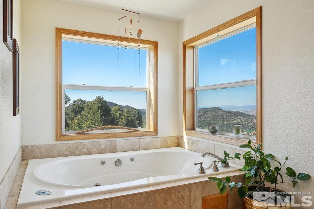 2045 Flint Road Reno, NV 89521 - Photo 19 of 33 a white bath tub sitting next to a window