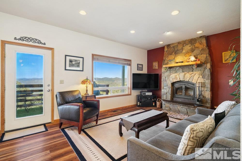 2045 Flint Road Reno, NV 89521 - Photo 2 of 33 a living room with furniture and a fireplace
