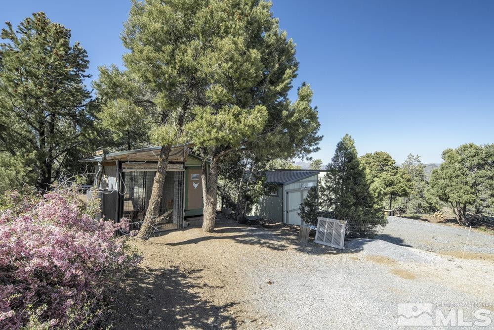 2045 Flint Road Reno, NV 89521 - Photo 28 of 33 a view of a house with a yard covered in snow