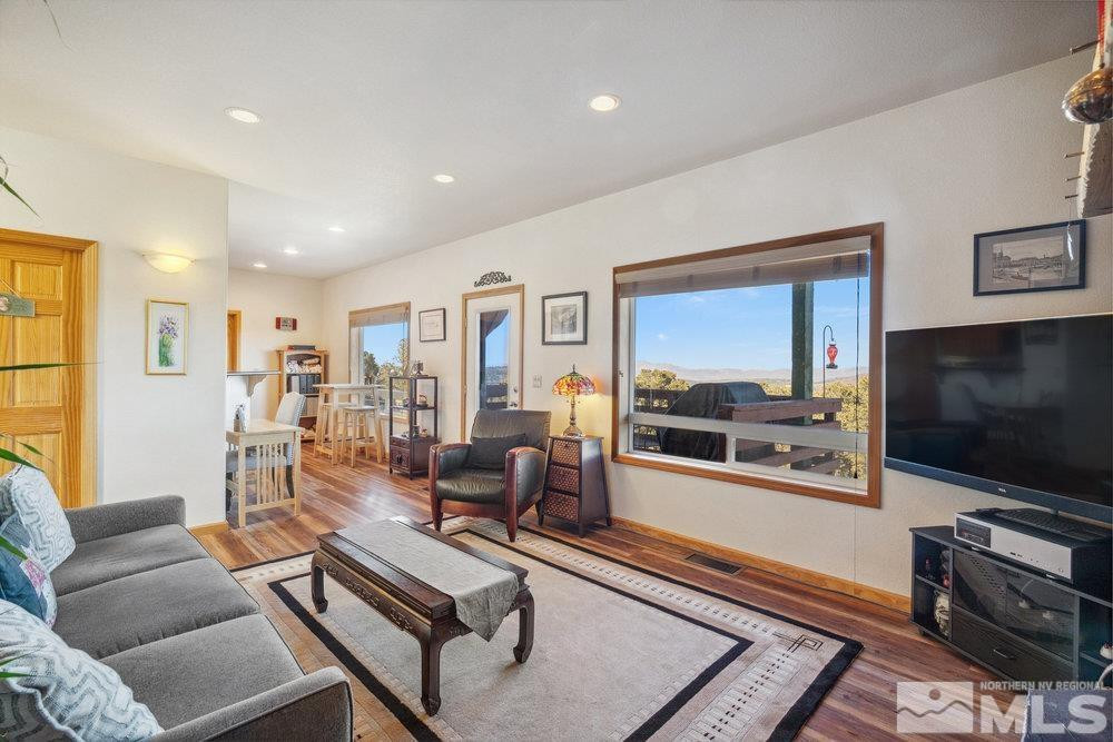 2045 Flint Road Reno, NV 89521 - Photo 5 of 33 a living room with furniture and a flat screen tv