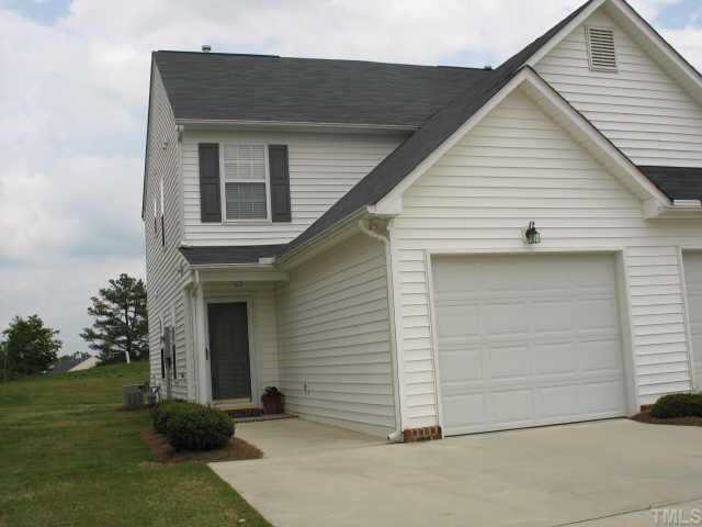 Incredible end unit right on the golf course! Shows like a model with neutral custom colors. This one is straight out of the Pottery Barn catalog! Exterior Front