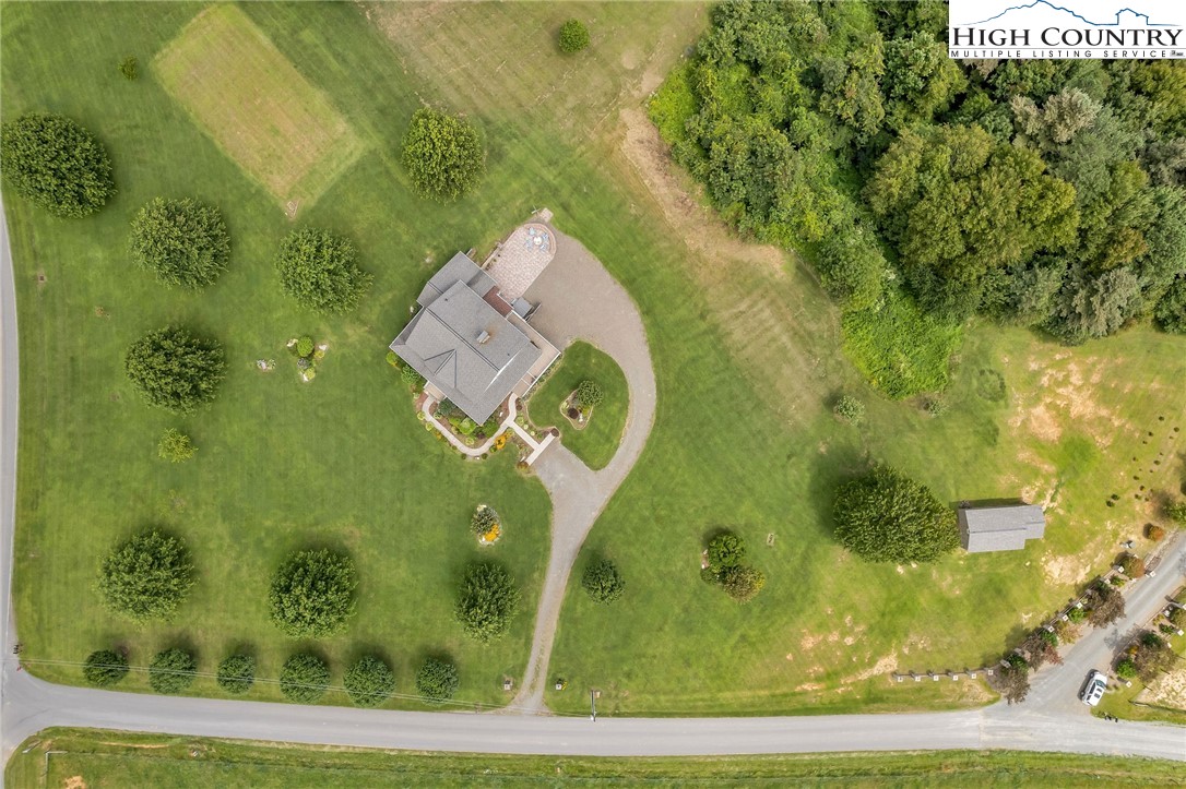 51 Horton Road Ennice, NC 28623 - Photo 17 of 44 swimming pool view with a garden