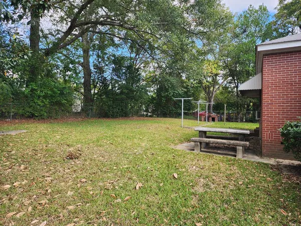 a garden view with a seating space