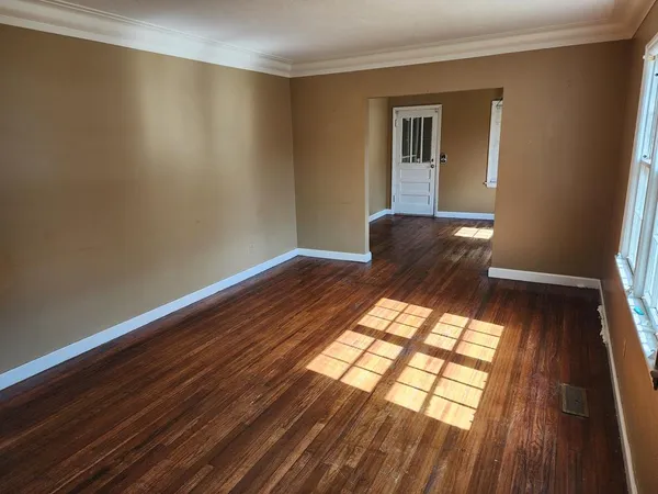 a view of an empty room and window