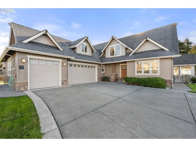 an aerial view of a house with outdoor space