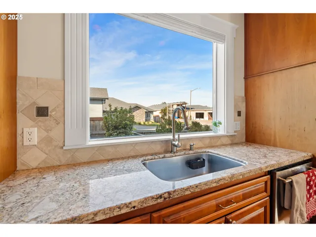 a spacious bedroom with a bed and a couch