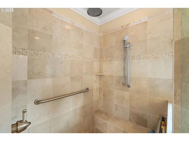 a view of entryway and hall with a front door