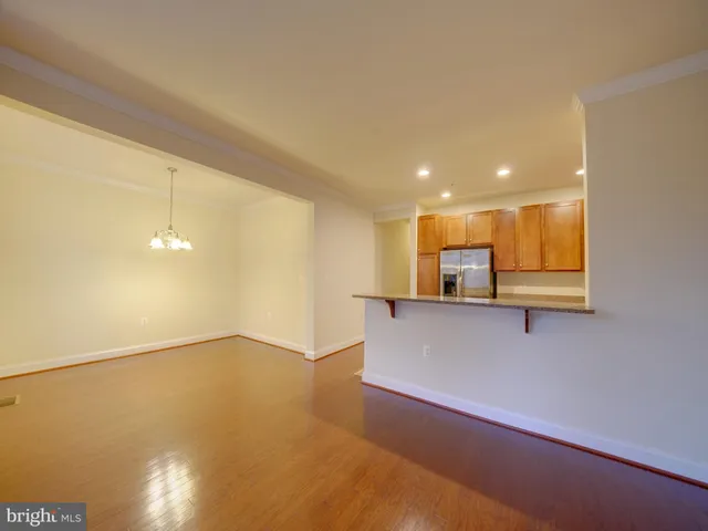 a view of a kitchen with a sink