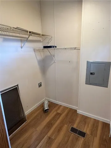 a view of a room with racks on the wall