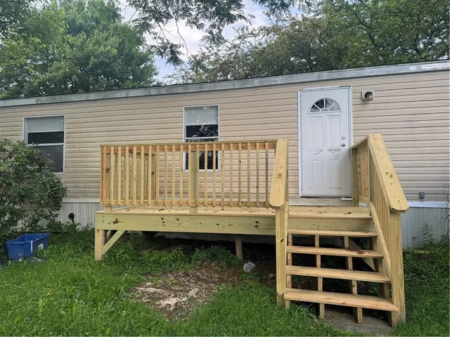 a view of a back yard of the house