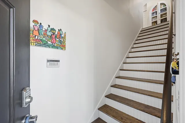 a view of a two chairs in the patio