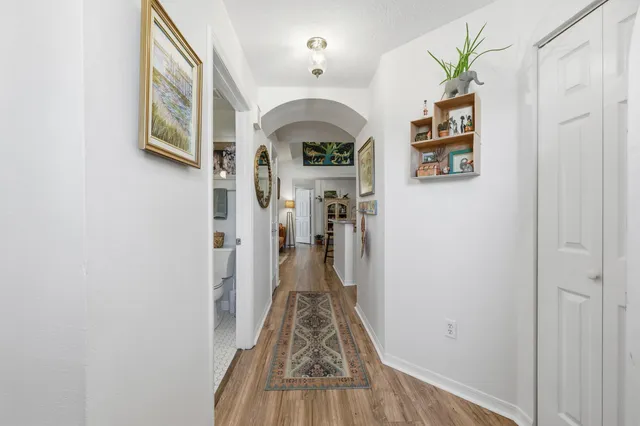 a view of a patio with a table and chairs