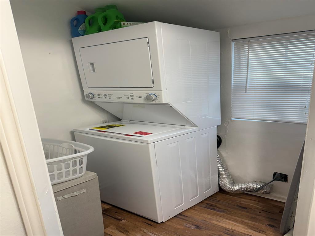4347 Travis Street, Unit 4347 Dallas, TX 75205 - Photo 10 of 12 a utility room with dryer and washer