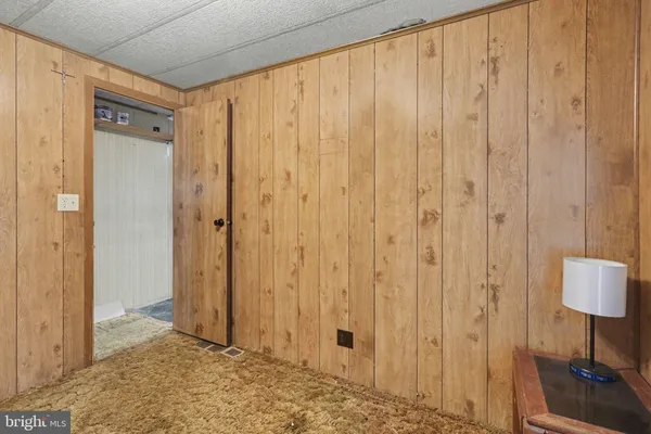 a view of a bathroom with a shower curtain
