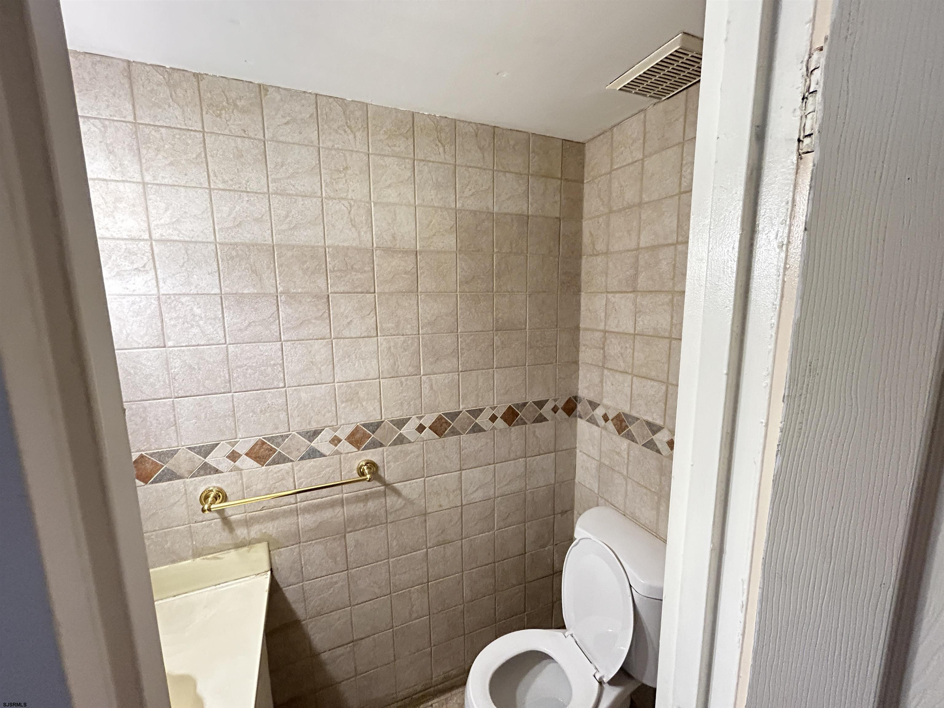 2465 Arbor Court, Unit 2465 Mays Landing, NJ 08330 - Photo 5 of 10 a bathroom with a sink and shower