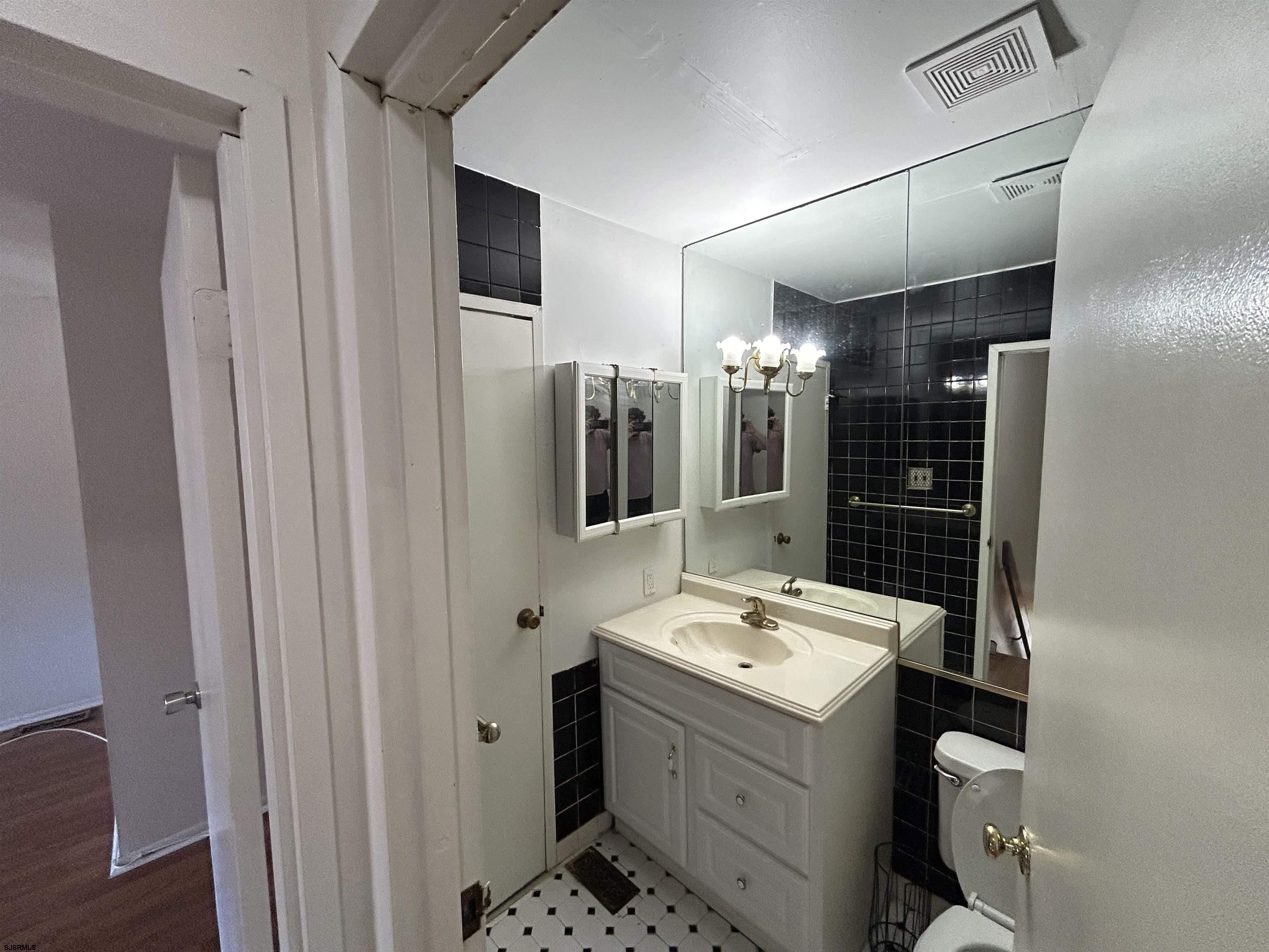 2465 Arbor Court, Unit 2465 Mays Landing, NJ 08330 - Photo 9 of 10 a room with dryer and washer