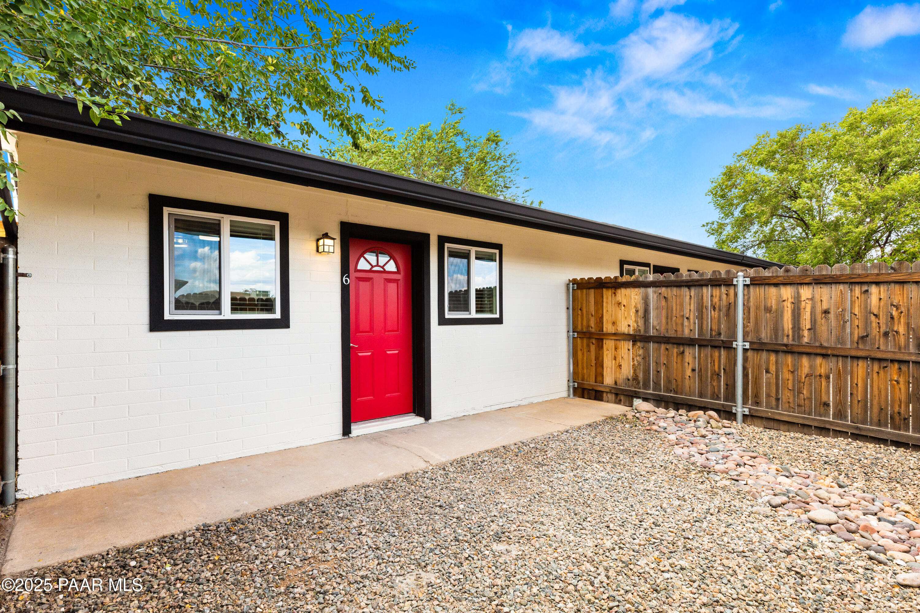 8339 Florentine Road, Unit 6 Prescott Valley, AZ 86314 - Photo 21 of 21 a view of a house with a garage