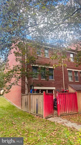 a view of swimming pool with a yard