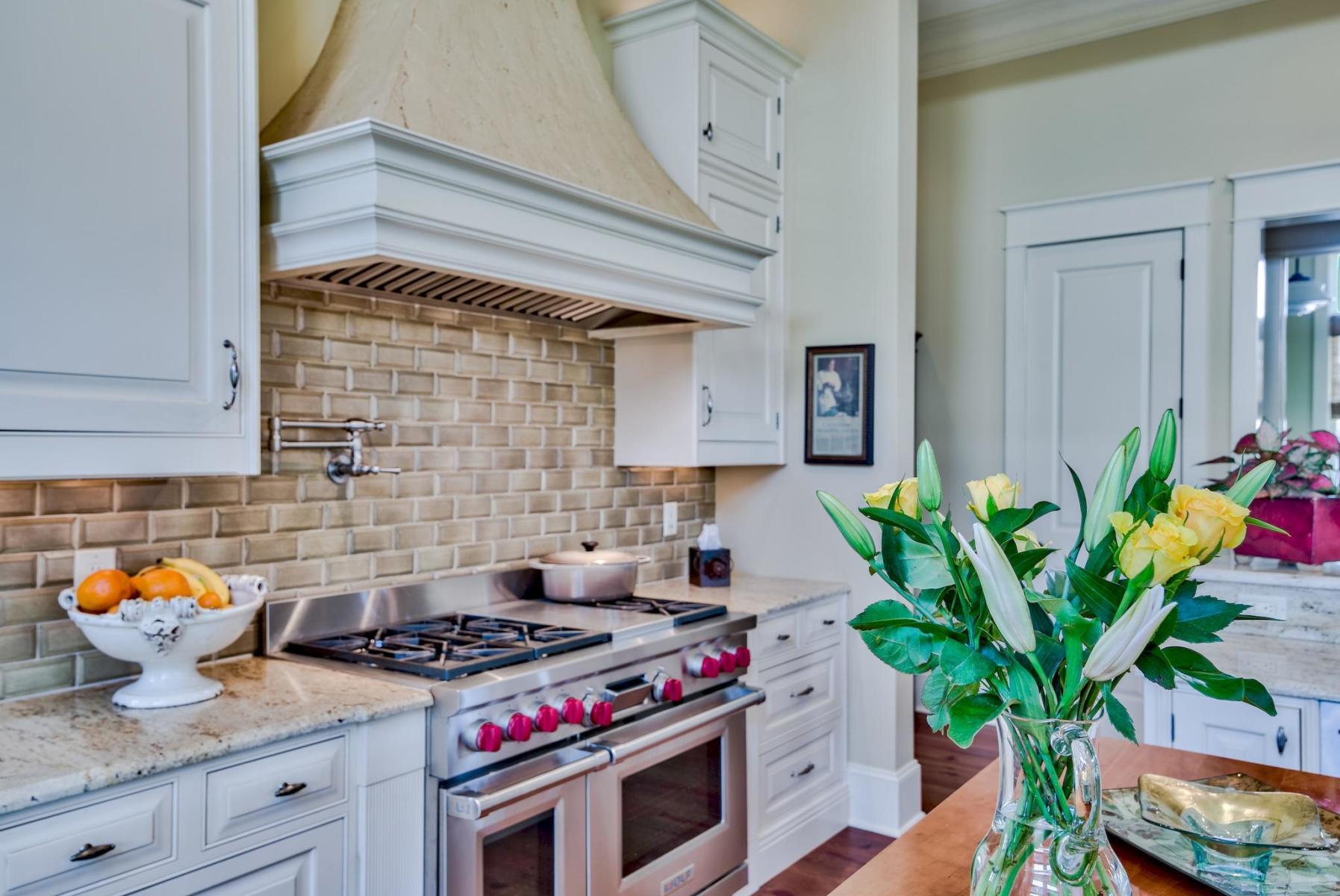 216 Sandtrap Road Miramar Beach, FL 32550 - Photo 17 of 58 a stove top oven sitting inside of a kitchen