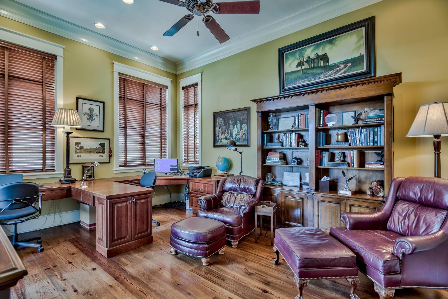 216 Sandtrap Road Miramar Beach, FL 32550 - Photo 19 of 58 a living room with furniture a bookshelf and a window