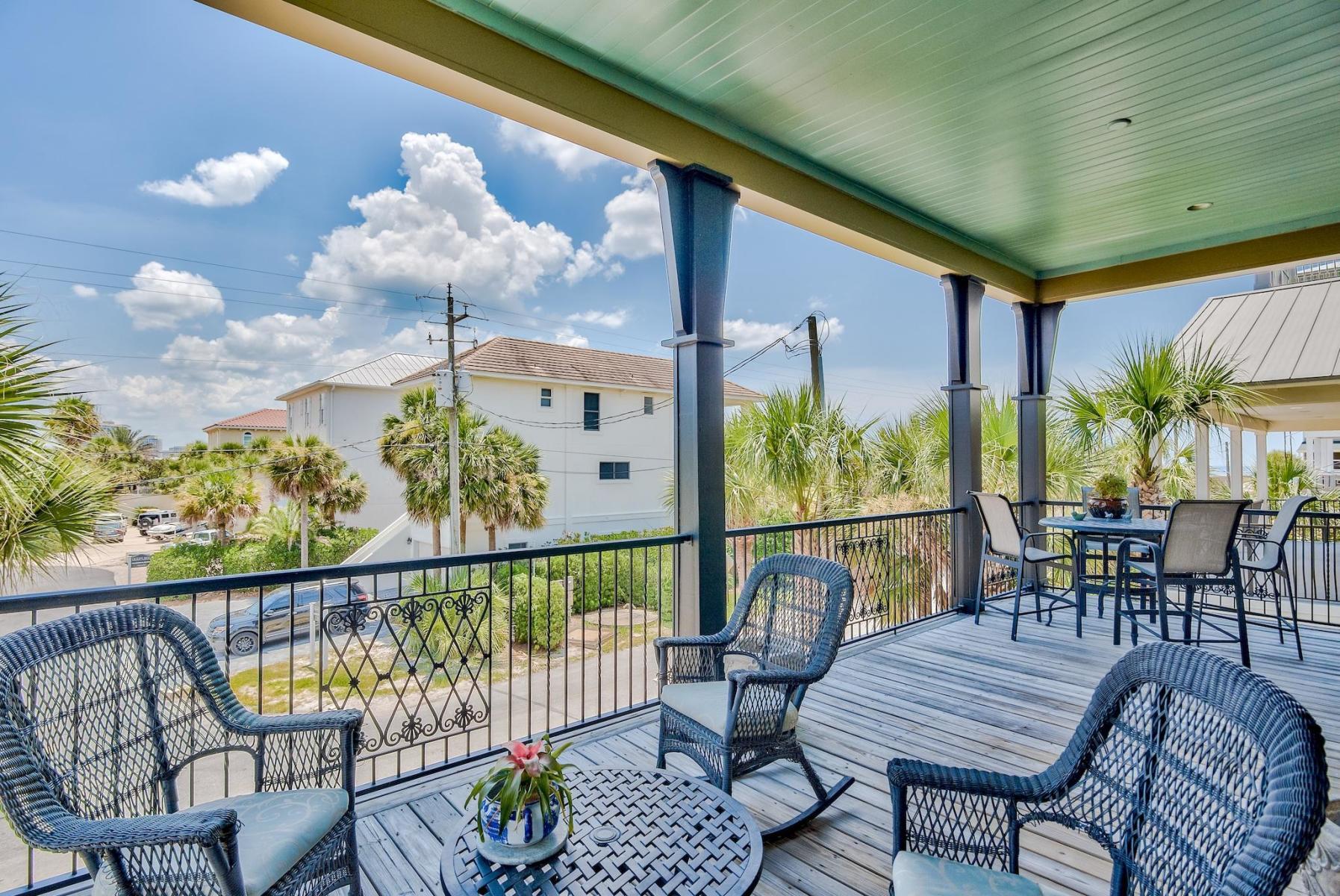 216 Sandtrap Road Miramar Beach, FL 32550 - Photo 24 of 58 a view of a chairs and table in patio