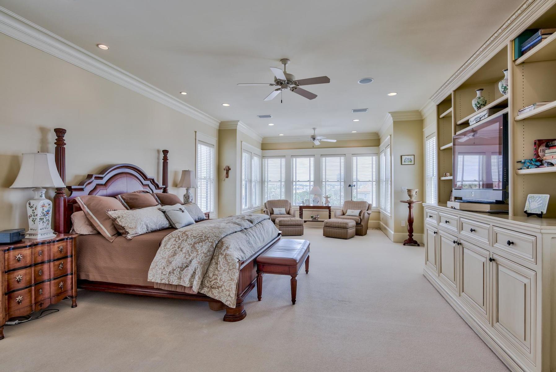 216 Sandtrap Road Miramar Beach, FL 32550 - Photo 26 of 58 a living room with furniture a bed and a large window