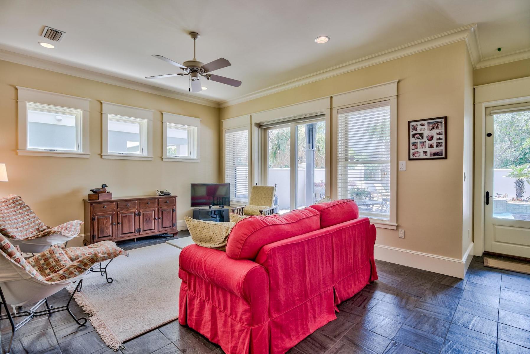 216 Sandtrap Road Miramar Beach, FL 32550 - Photo 37 of 58 a living room with furniture and a fireplace