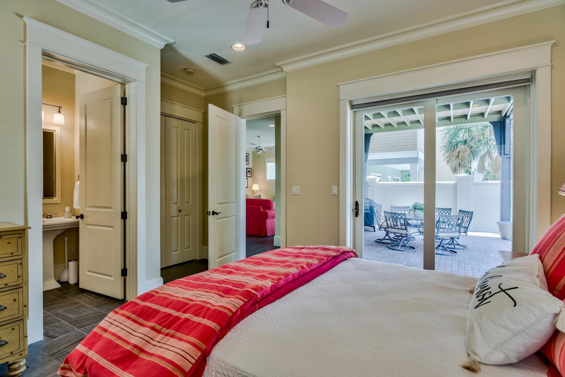 216 Sandtrap Road Miramar Beach, FL 32550 - Photo 40 of 58 a bedroom with a bed and a chandelier