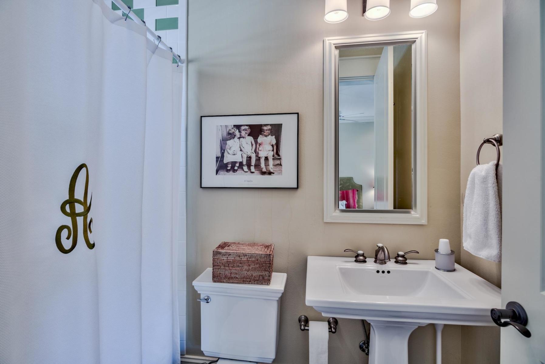 216 Sandtrap Road Miramar Beach, FL 32550 - Photo 41 of 58 a bathroom with a sink and a mirror