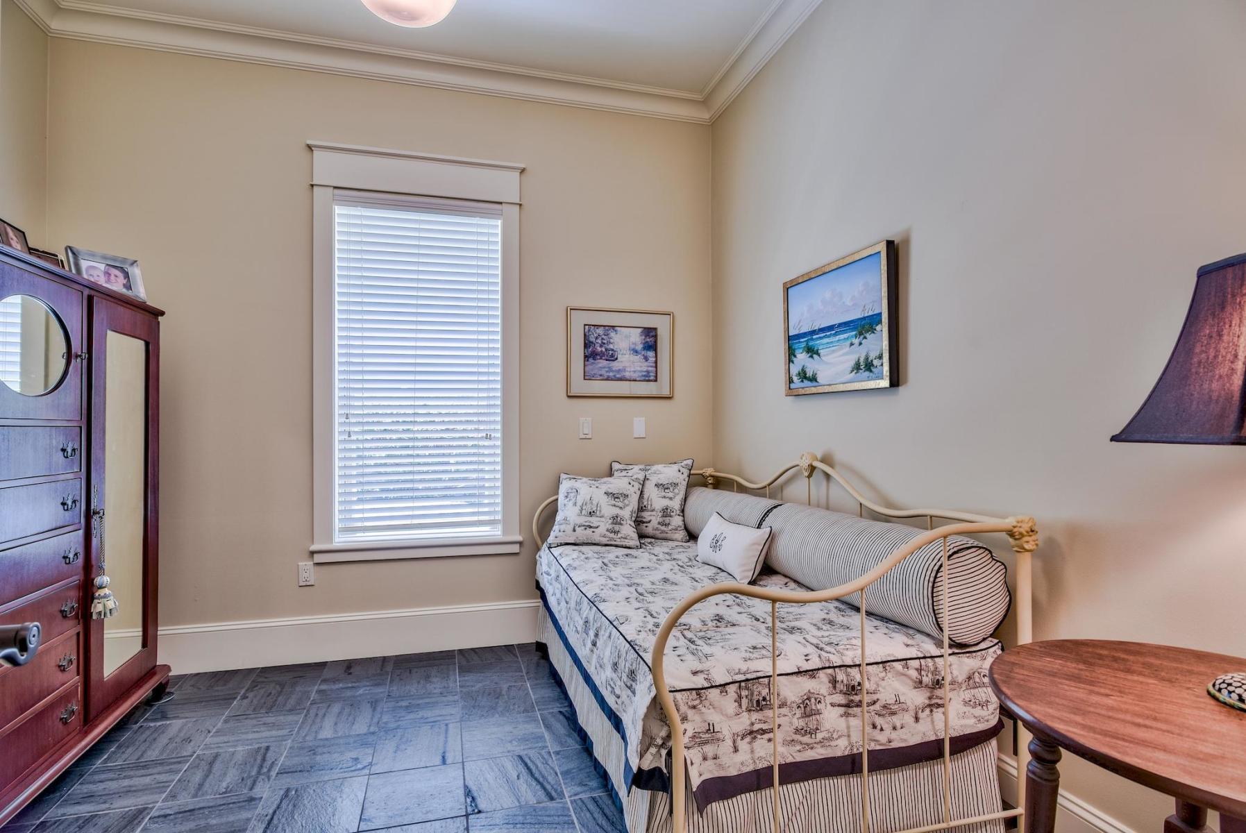 216 Sandtrap Road Miramar Beach, FL 32550 - Photo 43 of 58 a bedroom with a bed and wooden floor