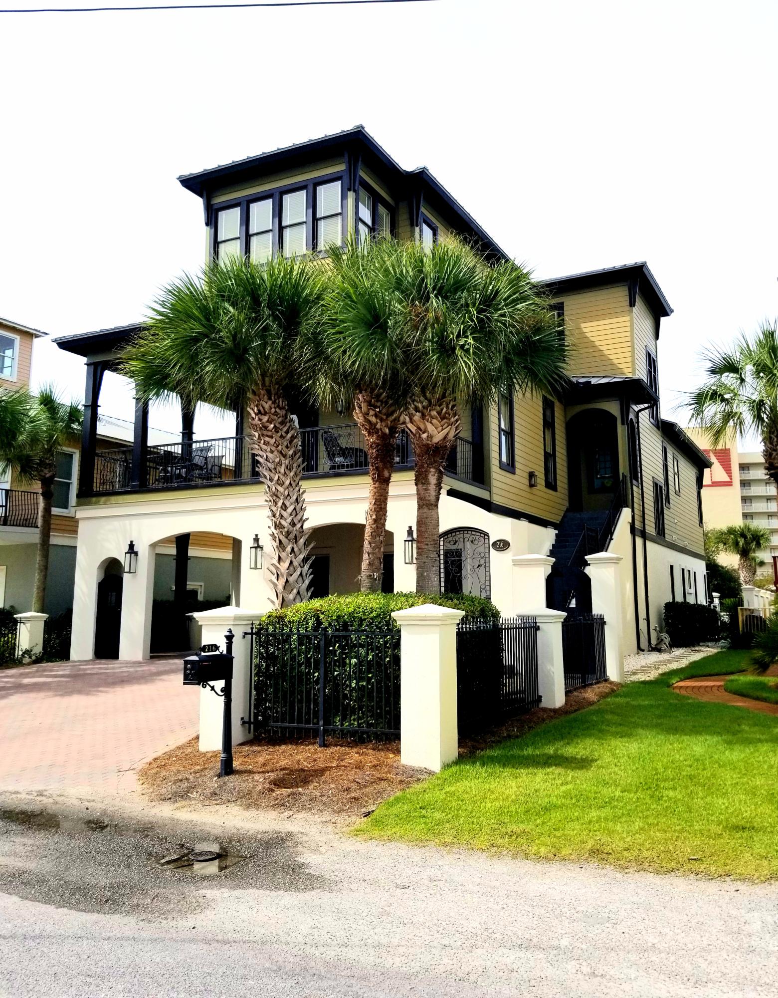 216 Sandtrap Road Miramar Beach, FL 32550 - Photo 5 of 58 a front view of a house with a yard