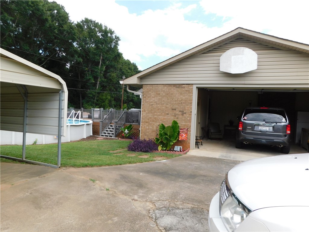 2705 Linmar Circle Anderson, SC 29621 - Photo 2 of 19 garage and extra carport
